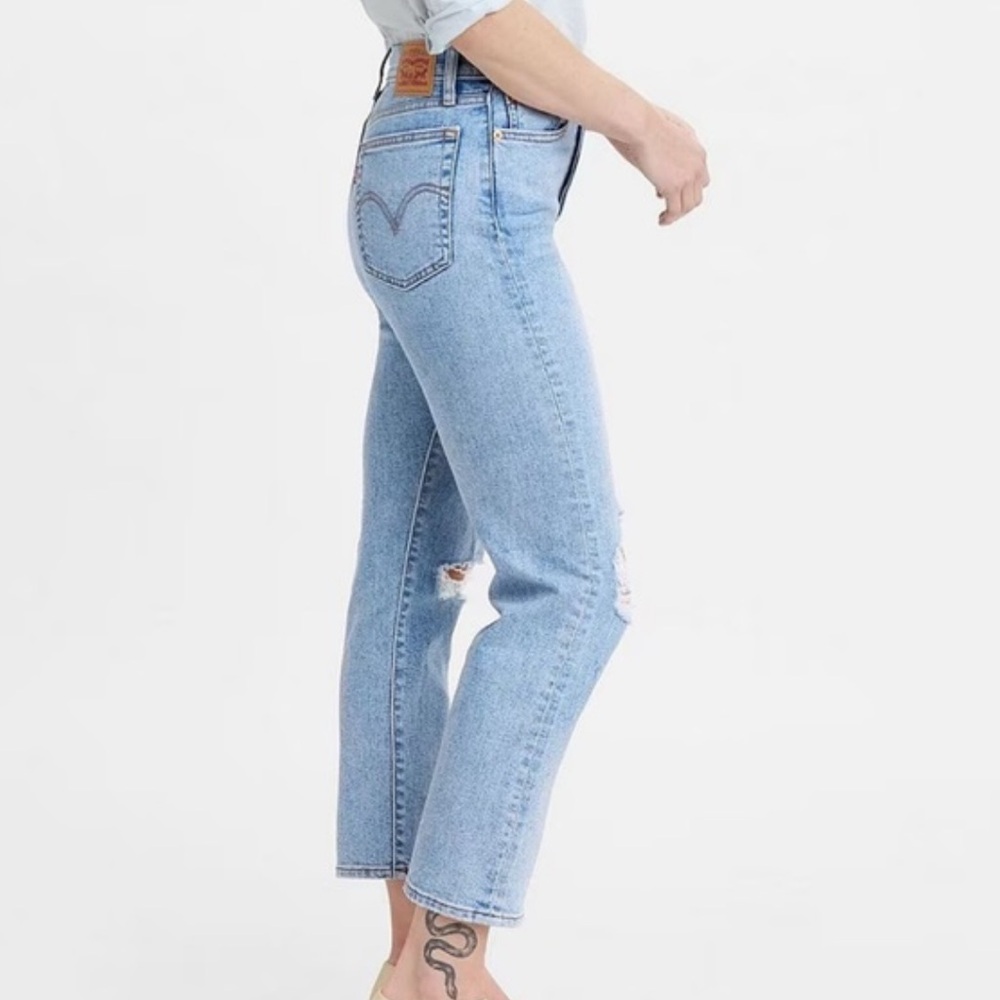 Distressed vintage Levi Wedgie Straight Jeans